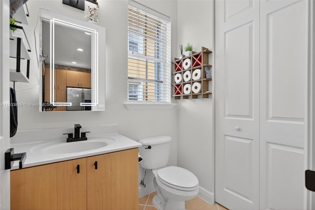 153 Apalachee Ln, Jupiter, FL 33458 - bathroom featuring a closet, vanity, and tile patterned flooring