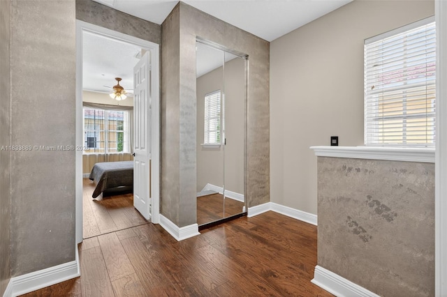 153 Apalachee Ln, Jupiter, FL 33458 - bathroom featuring a ceiling fan, hardwood / wood-style flooring, and connected bathroom