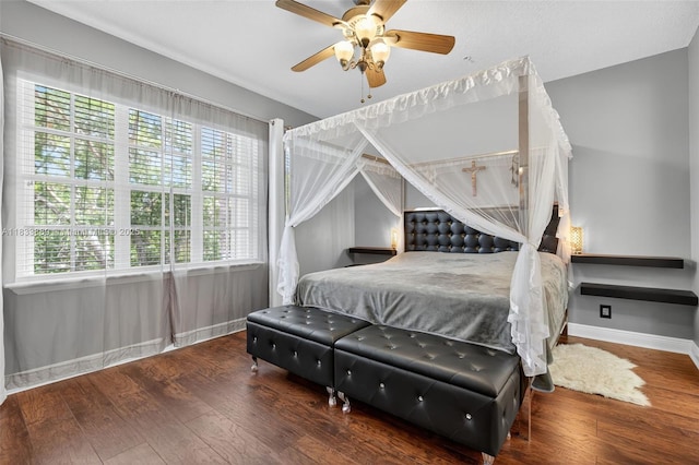 153 Apalachee Ln, Jupiter, FL 33458 - bedroom featuring wood finished floors and a ceiling fan