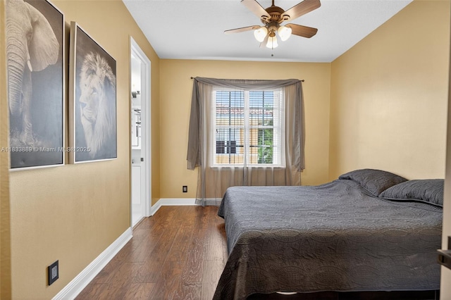 153 Apalachee Ln, Jupiter, FL 33458 - bedroom with dark wood finished floors and a ceiling fan