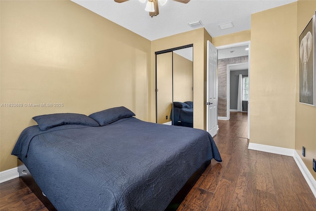 153 Apalachee Ln, Jupiter, FL 33458 - bedroom with wood finished floors, a ceiling fan, and a closet