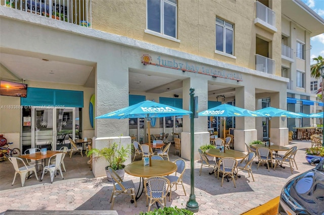 153 Apalachee Ln, Jupiter, FL 33458 - view of patio / terrace featuring outdoor dining space