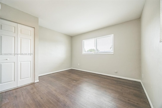 4931 NW 13th St, Lauderhill, FL 33313 - unfurnished bedroom featuring wood finished floors and a closet