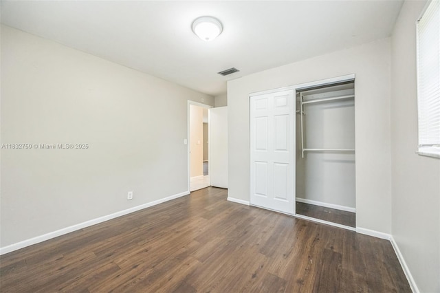4931 NW 13th St, Lauderhill, FL 33313 - unfurnished bedroom featuring wood finished floors and a closet