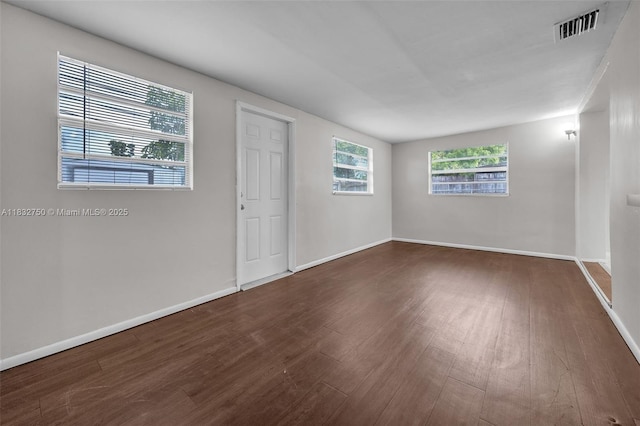 4931 NW 13th St, Lauderhill, FL 33313 - empty room featuring wood finished floors and baseboards
