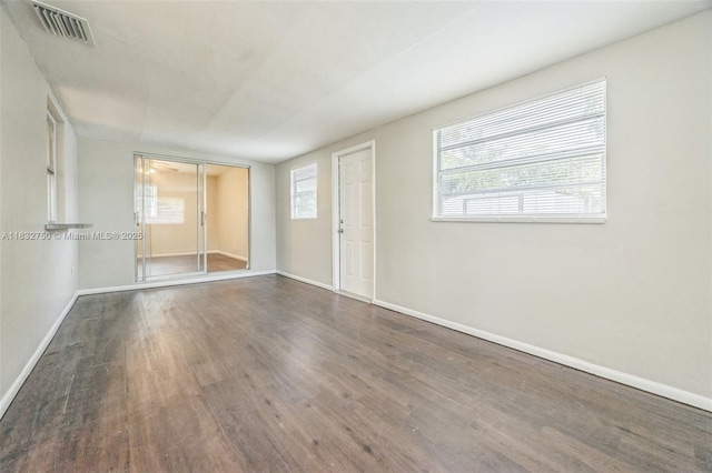4931 NW 13th St, Lauderhill, FL 33313 - unfurnished room with wood finished floors and baseboards