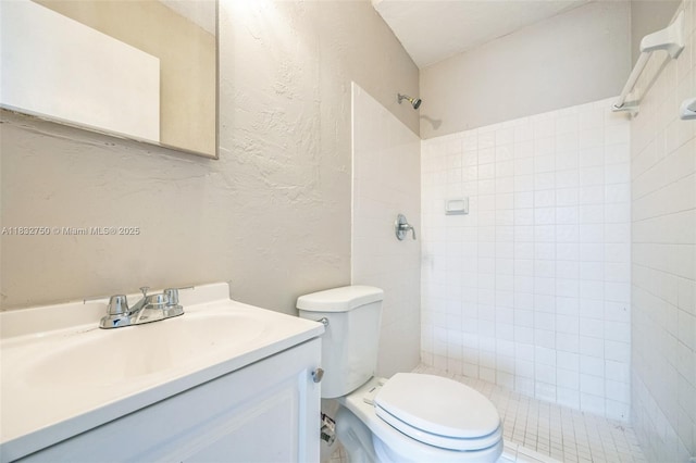 4931 NW 13th St, Lauderhill, FL 33313 - full bathroom featuring a textured wall, vanity, and tiled shower
