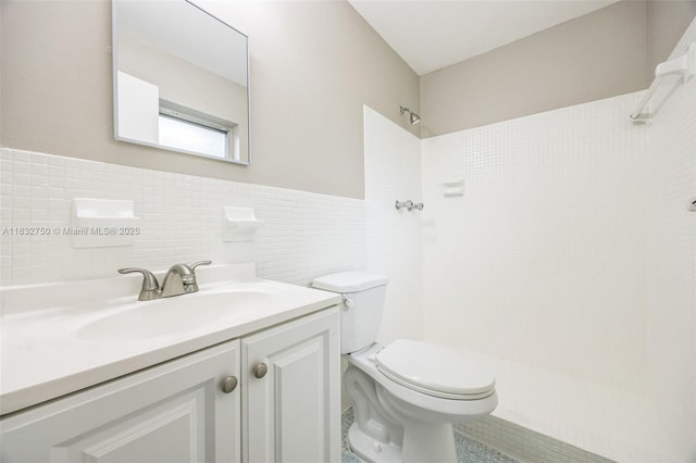 4931 NW 13th St, Lauderhill, FL 33313 - bathroom featuring a shower, tile walls, and vanity