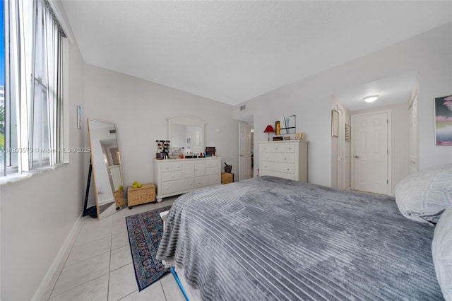 4330 Hillcrest Dr Unit 104, Hollywood, FL 33021 - bedroom featuring light tile patterned floors and baseboards