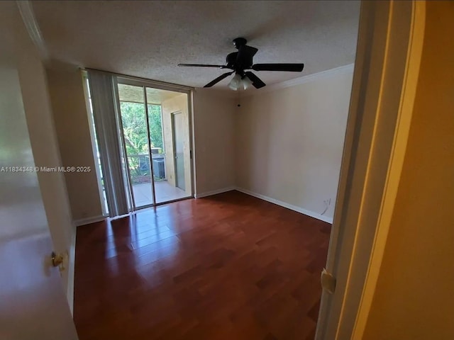 3995 W Mcnab Rd Unit B105, Pompano Beach, FL 33069 - unfurnished room featuring crown molding, ceiling fan, a wall of windows, and wood finished floors