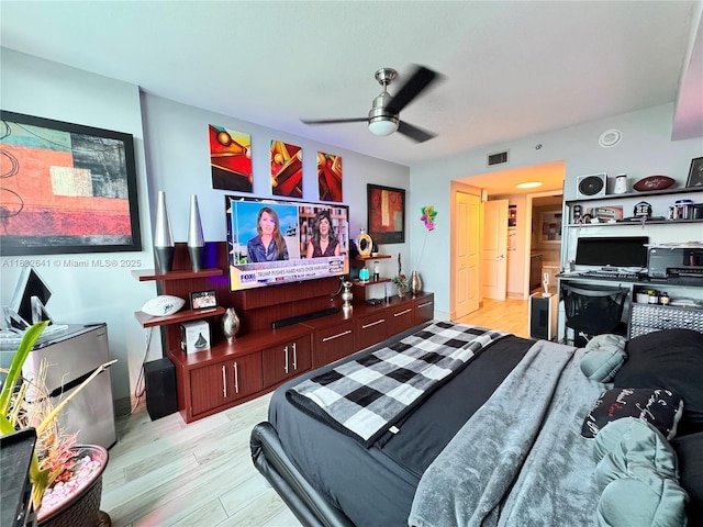 2641 N Flamingo Rd Unit 1203N, Sunrise, FL 33323 - bedroom with light wood-type flooring and a ceiling fan