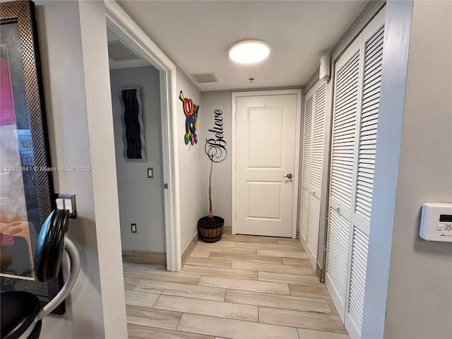 2641 N Flamingo Rd Unit 1203N, Sunrise, FL 33323 - hall with wood tiled floors and baseboards