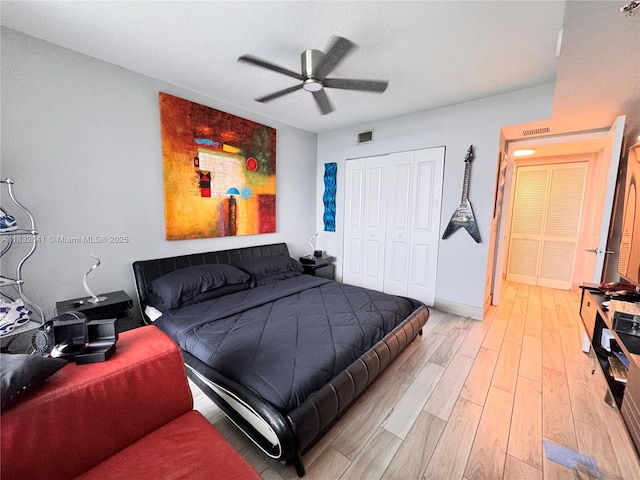 2641 N Flamingo Rd Unit 1203N, Sunrise, FL 33323 - bedroom with light wood finished floors, a closet, and a ceiling fan