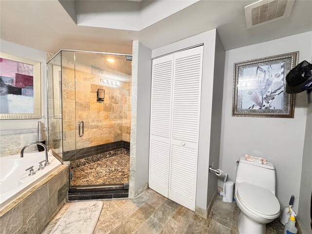 2641 N Flamingo Rd Unit 1203N, Sunrise, FL 33323 - full bath with a closet, a bath, a shower stall, and stone finish floors