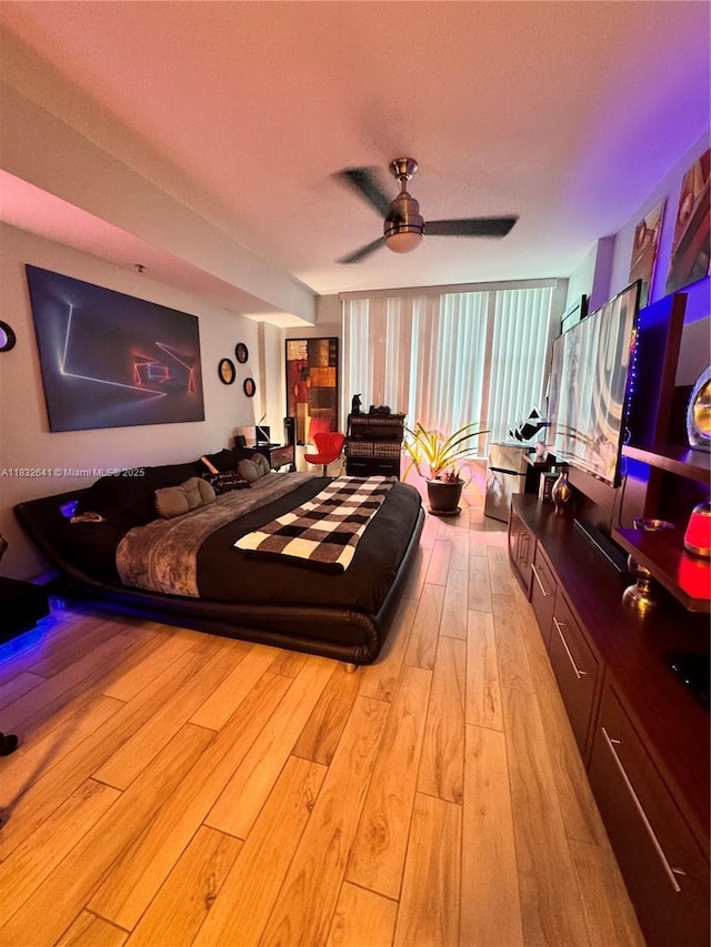 2641 N Flamingo Rd Unit 1203N, Sunrise, FL 33323 - bedroom with light wood-type flooring and a ceiling fan