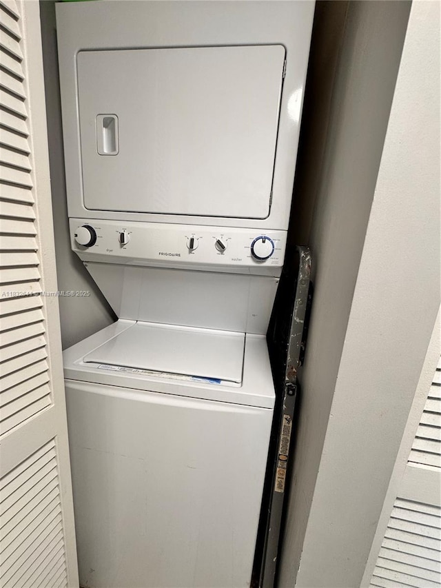 2641 N Flamingo Rd Unit 1203N, Sunrise, FL 33323 - laundry room featuring stacked washer / dryer