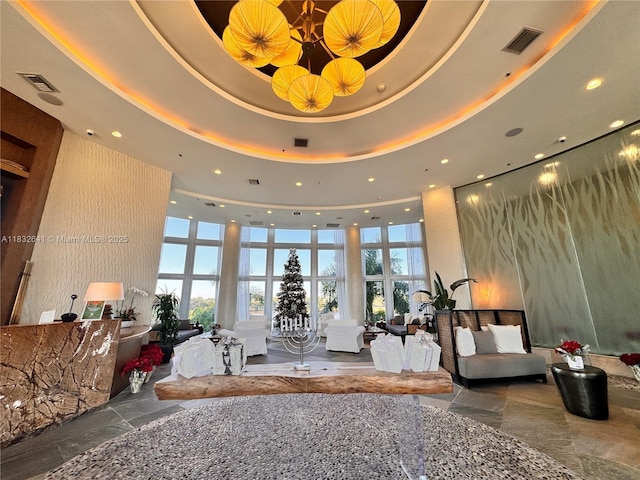 2641 N Flamingo Rd Unit 1203N, Sunrise, FL 33323 - building lobby featuring a towering ceiling and recessed lighting