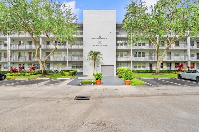 251 SW 132nd Way Unit 201H, Pembroke Pines, FL 33027 - view of apartment building / complex with uncovered parking