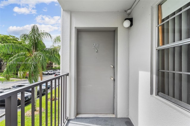 251 SW 132nd Way Unit 201H, Pembroke Pines, FL 33027 - property entrance featuring stucco siding and a balcony