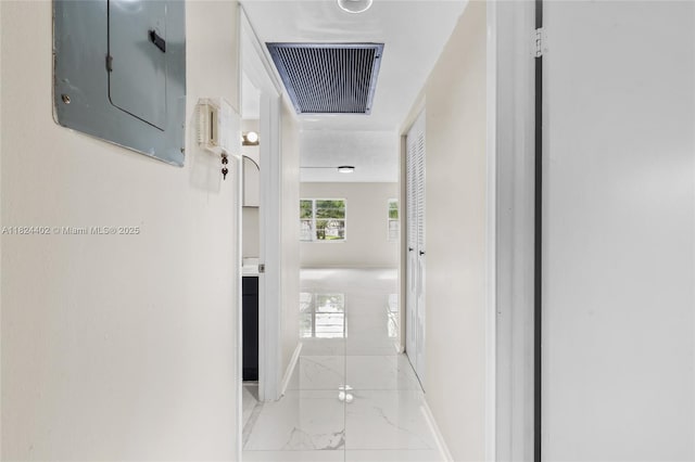 251 SW 132nd Way Unit 201H, Pembroke Pines, FL 33027 - corridor with marble look tile flooring and electric panel