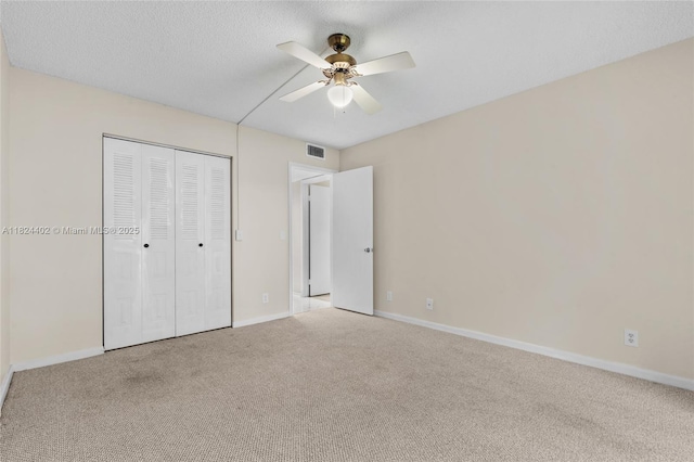 251 SW 132nd Way Unit 201H, Pembroke Pines, FL 33027 - unfurnished bedroom featuring carpet, a closet, and ceiling fan