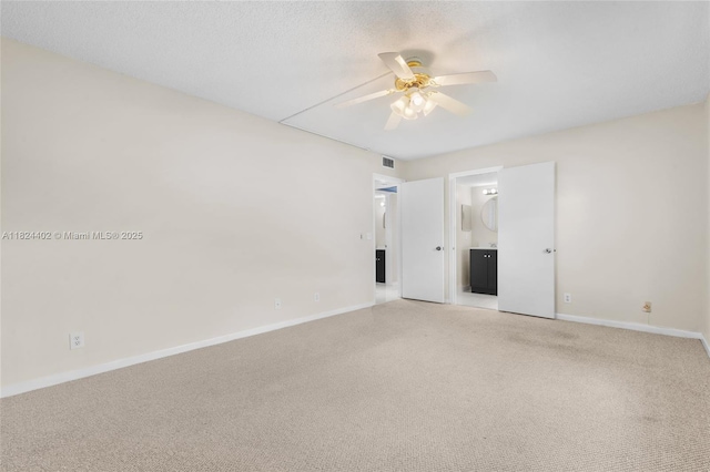 251 SW 132nd Way Unit 201H, Pembroke Pines, FL 33027 - empty room with a ceiling fan and light colored carpet