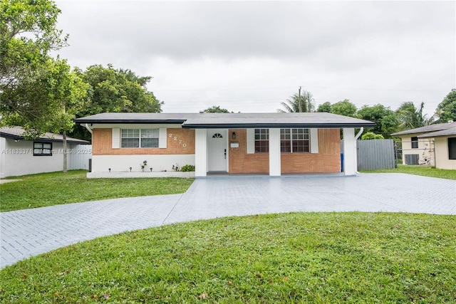 2270 Havana Dr, Miramar, FL 33023 - ranch-style house with brick siding and driveway