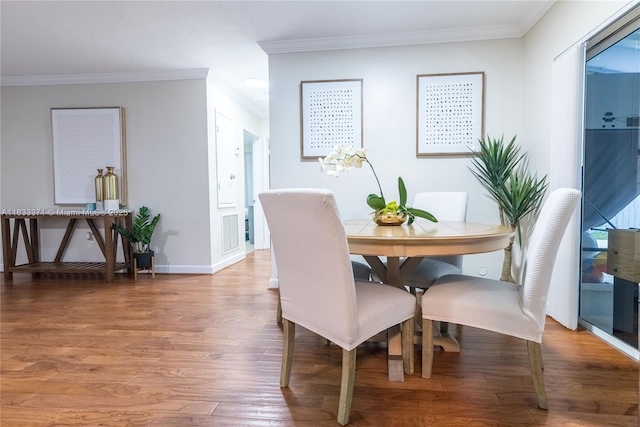 2270 Havana Dr, Miramar, FL 33023 - dining room with crown molding and light wood-type flooring