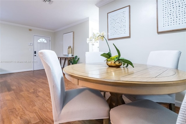 2270 Havana Dr, Miramar, FL 33023 - dining room featuring ornamental molding and wood finished floors