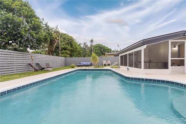 2270 Havana Dr, Miramar, FL 33023 - view of pool with a sunroom and a fenced backyard