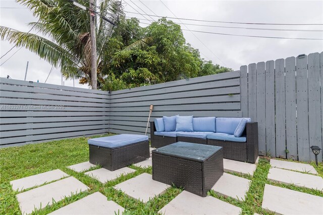 2270 Havana Dr, Miramar, FL 33023 - fenced backyard with outdoor lounge area and a patio area