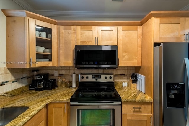 2270 Havana Dr, Miramar, FL 33023 - kitchen featuring stainless steel appliances, light stone counters, decorative backsplash, light brown cabinets, and ornamental molding