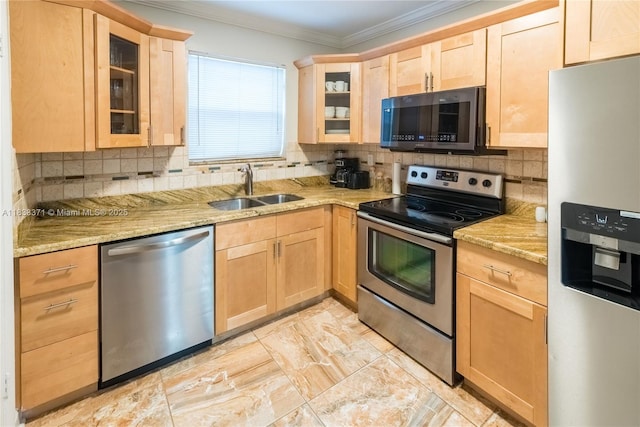 2270 Havana Dr, Miramar, FL 33023 - kitchen with appliances with stainless steel finishes, light brown cabinetry, tasteful backsplash, light stone countertops, and ornamental molding