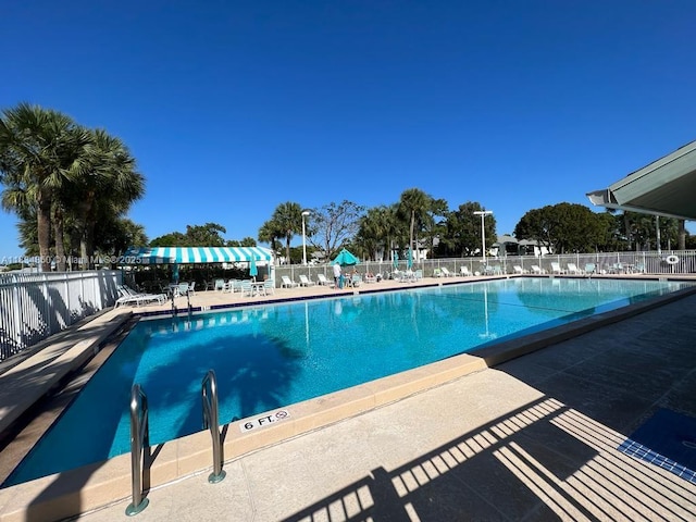 3606 Alder Dr Unit F2, West Palm Beach, FL 33417 - community pool featuring a patio