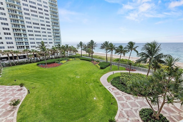 3200 N Ocean Blvd Unit 405, Fort Lauderdale, FL 33308 - view of community featuring a water view and a lawn