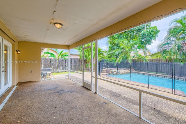 11035 NW 27th St, Sunrise, FL 33322 - fenced backyard with a patio area and a pool with connected hot tub