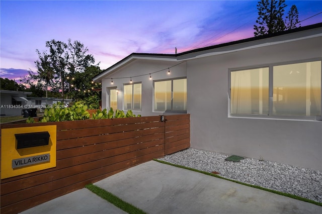 2380 NE 137th St, North Miami Beach, FL 33181 - view of property exterior featuring a patio and stucco siding