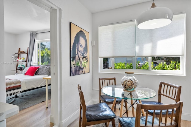 2380 NE 137th St, North Miami Beach, FL 33181 - dining space with wood finished floors and baseboards