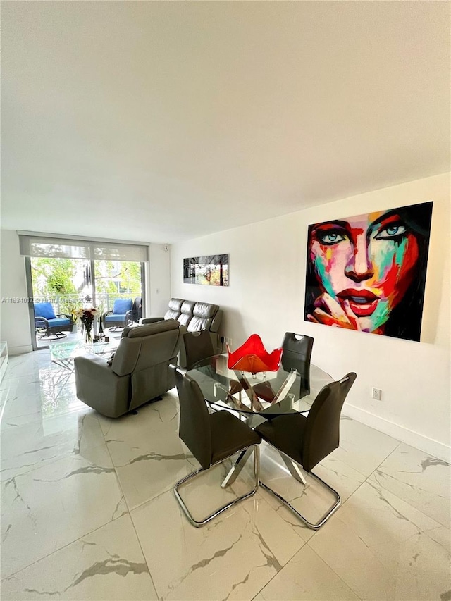 680 NE 64th St Unit A501, Miami, FL 33138 - dining area featuring marble finish flooring and baseboards