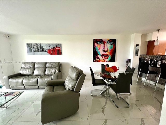 680 NE 64th St Unit A501, Miami, FL 33138 - living room featuring light marble finish floors