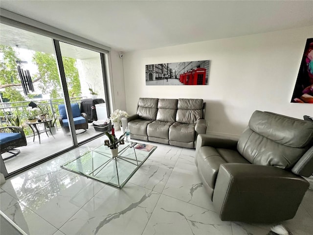 680 NE 64th St Unit A501, Miami, FL 33138 - living room featuring marble finish flooring and floor to ceiling windows
