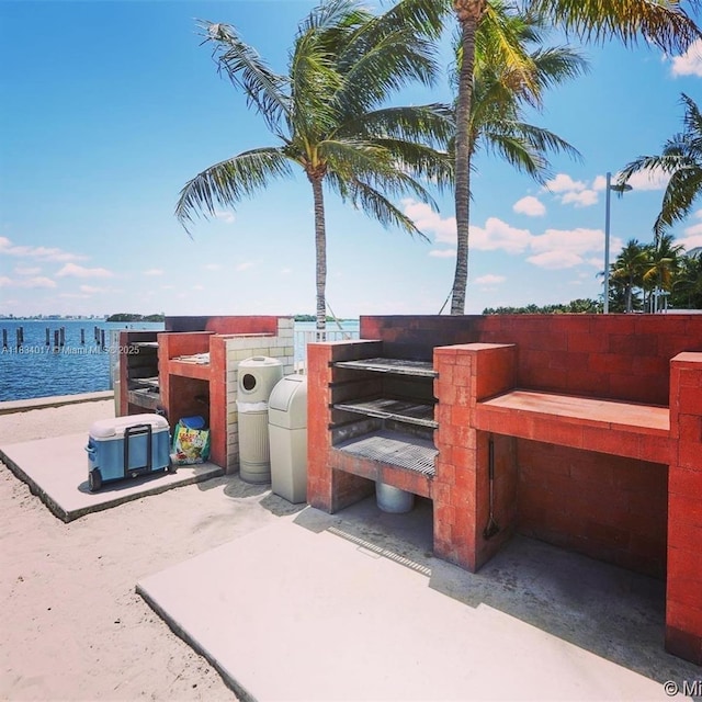 680 NE 64th St Unit A501, Miami, FL 33138 - view of patio with a water view