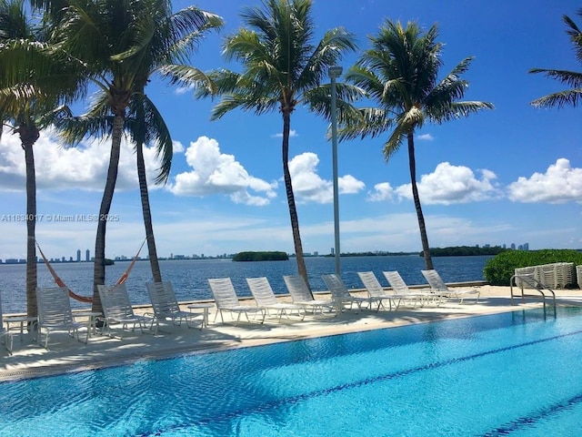 680 NE 64th St Unit A501, Miami, FL 33138 - community pool featuring a water view and a patio area