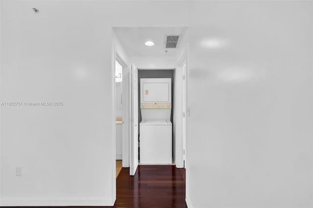 275 NE 18th St Unit 706, Miami, FL 33132 - hallway with estacked washer and dryer, wood finished floors, and recessed lighting