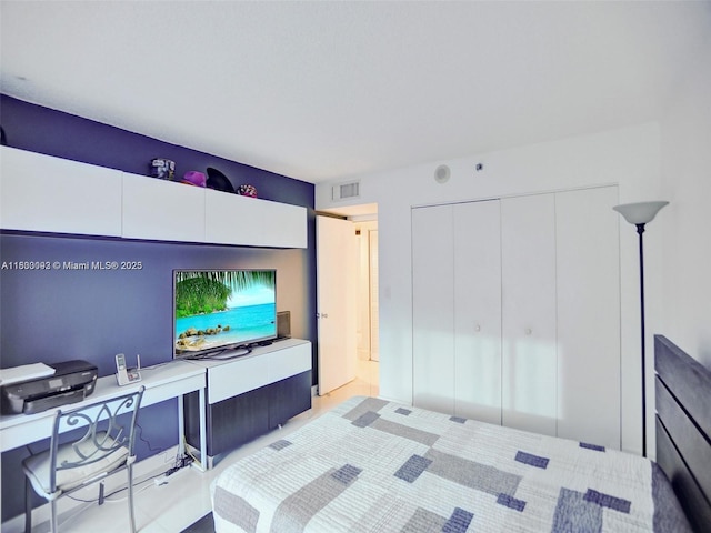 1627 Brickell Ave Unit 605, Miami, FL 33129 - bedroom with a closet and a desk
