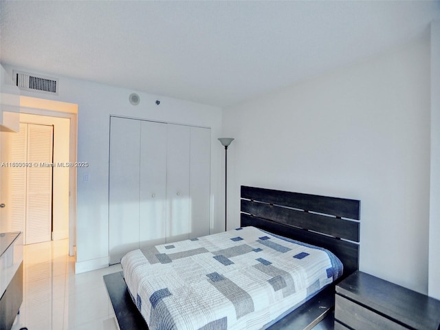 1627 Brickell Ave Unit 605, Miami, FL 33129 - tiled bedroom with a closet