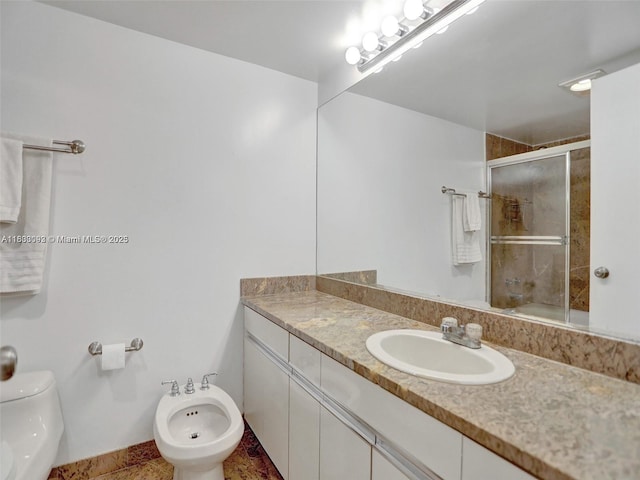 1627 Brickell Ave Unit 605, Miami, FL 33129 - full bathroom with a bidet, a shower with shower door, and vanity