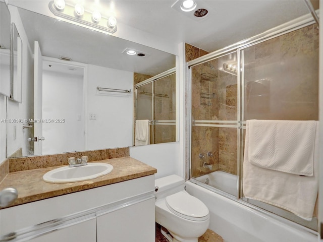 1627 Brickell Ave Unit 605, Miami, FL 33129 - bathroom with vanity and shower / bath combination with glass door