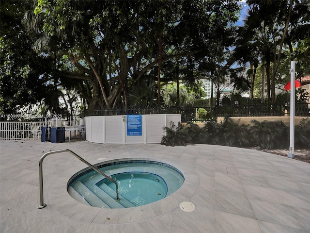 1627 Brickell Ave Unit 605, Miami, FL 33129 - view of swimming pool with a hot tub