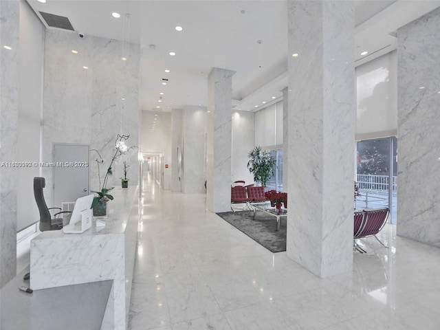 1627 Brickell Ave Unit 605, Miami, FL 33129 - building lobby featuring recessed lighting